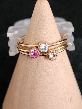 Gold Tone Stacked Ring Trio with Pink, Clear, and Champagne Stones